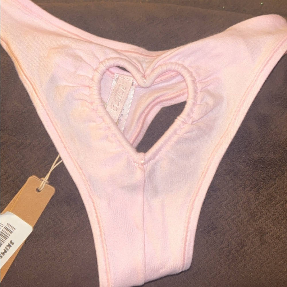 SKIMS sold out heart cut out thong new with tags size SMALL